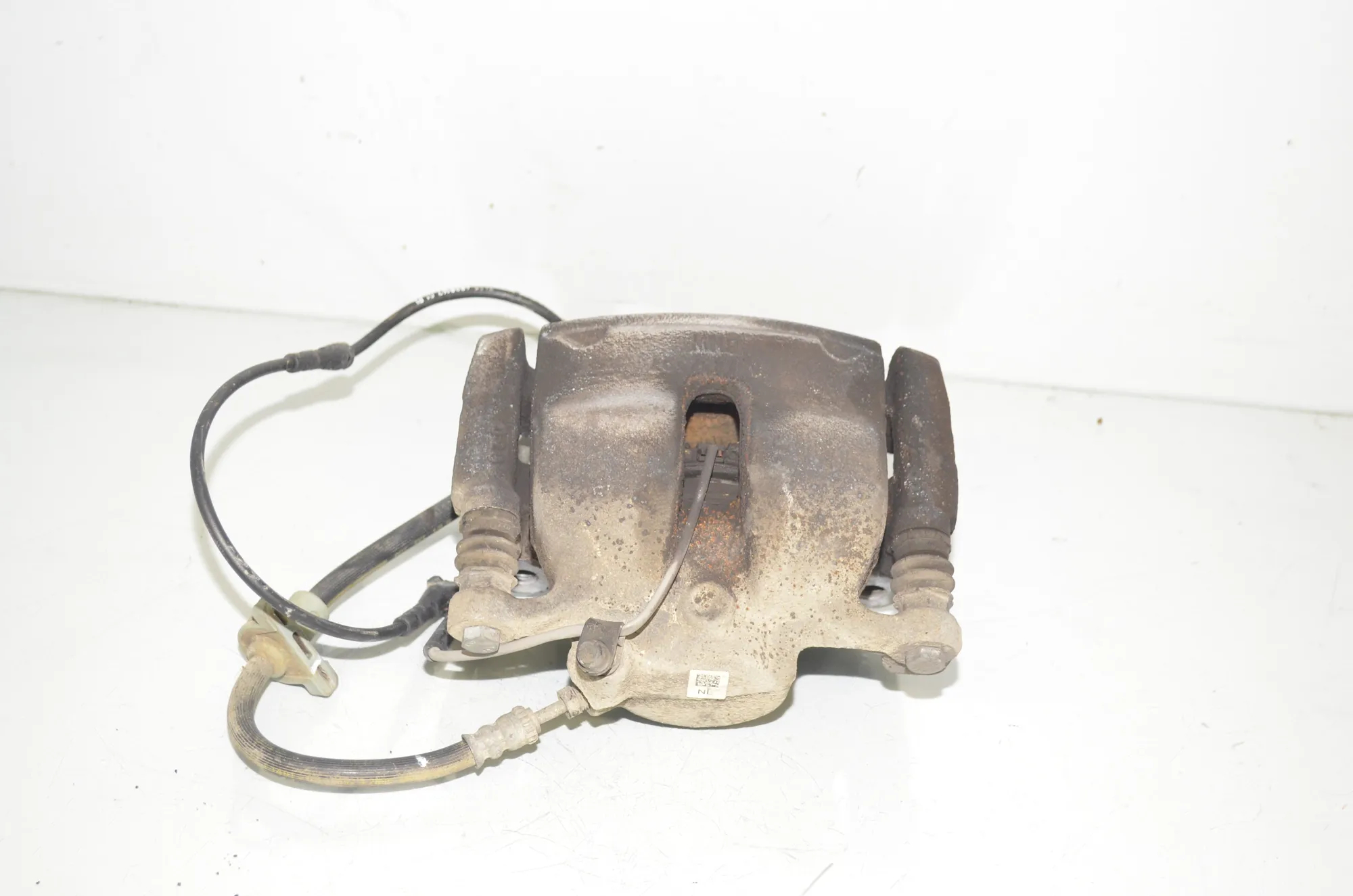 Front Left Brake Caliper – OEM 6860265 · BMW X1 (F48) xDrive 18 d 2018 – 2