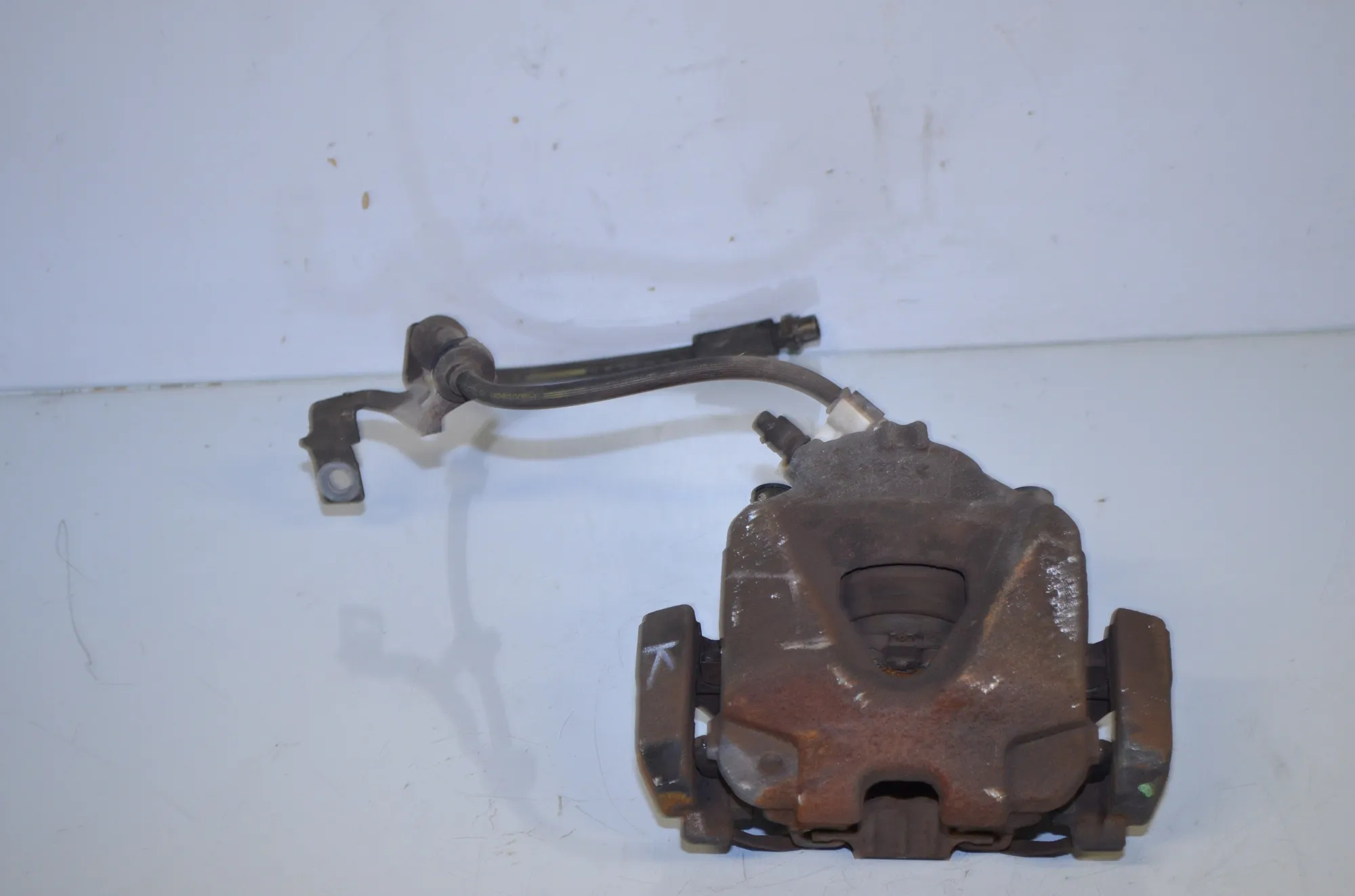 Front Left Brake Caliper – OEM 6778145 · BMW X1 (E84) sDrive 20 i 2013